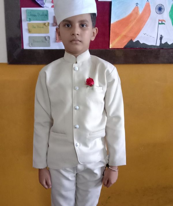 Customer child wearing a white Lil Homies bandhgala suit